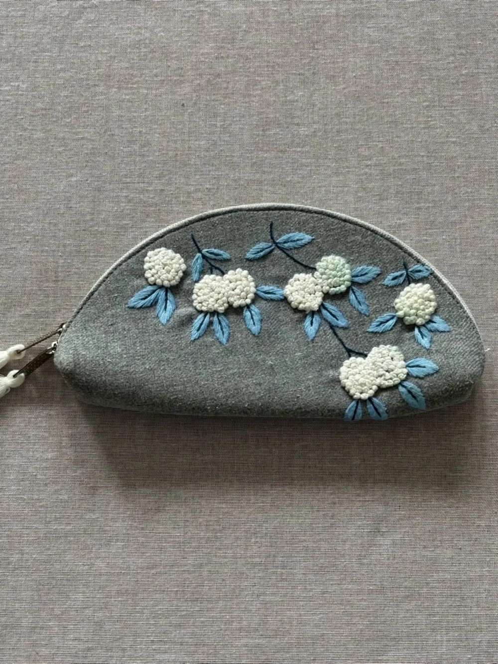 Grey embroidered floral half moon whimsical coquette clutch bag.